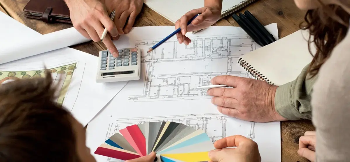 The designer leaned over the project
